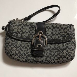 Coach black canvas print wristlet with side pocket